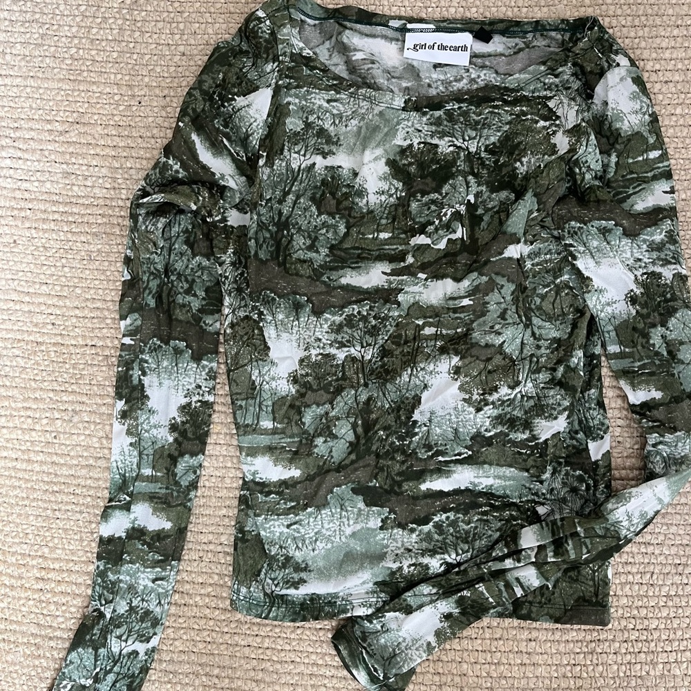 Girl of the earth green top